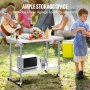 Mesa de trabajo de acero inoxidable VEVOR con amplio espacio de almacenamiento, perfecta para cocinar al aire libre y preparar alimentos.