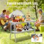 Mesa de trabajo comercial VEVOR en un picnic con frutas, vino, pan y una carpa al fondo.