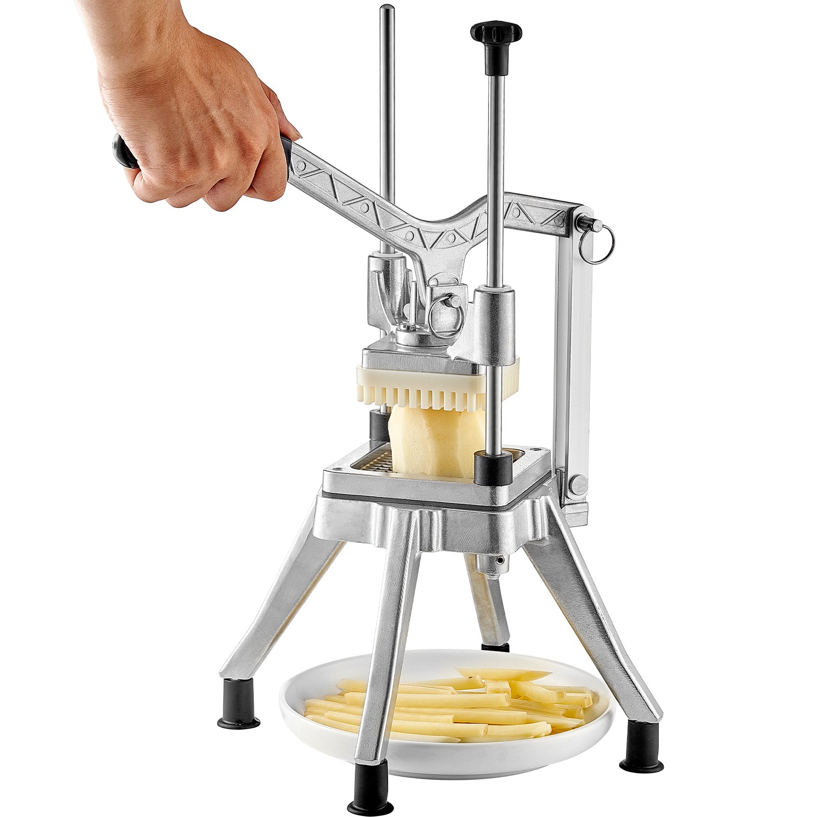 Mano usando la picadora de frutas y verduras VEVOR para cortar patatas en palitos sobre un plato blanco.