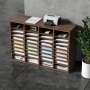 Configuración de oficina con organizadores de literatura VEVOR, una impresora, documentos y una planta en maceta.