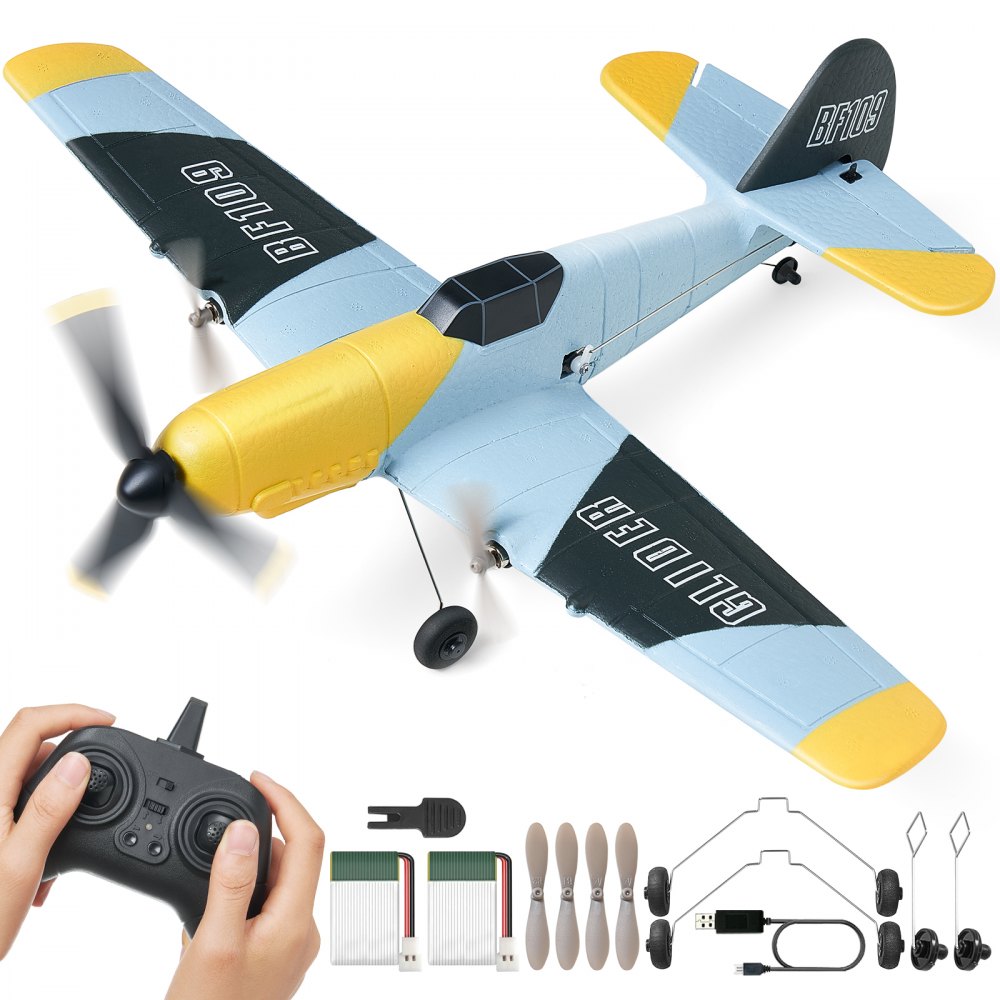 Avión RC VEVOR con nariz amarilla, controlador, hélices adicionales, baterías y kit de accesorios.