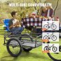 Remolque de carga para bicicletas VEVOR en un entorno de picnic que demuestra la compatibilidad con varias bicicletas: bicicletas de montaña, de ciudad y de carretera.