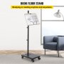Atril de lectura VEVOR con soporte para libros, altura regulable y ruedas, colocado junto a una silla en una habitación moderna.