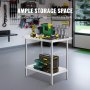 Table de préparation en acier inoxydable VEVOR avec outils, offrant un grand espace de rangement dans un garage bien organisé.