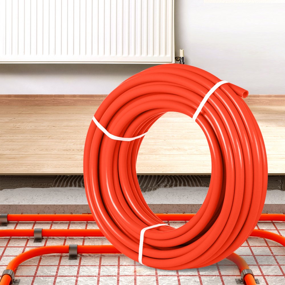 Tubo pex VEVOR enrollado en rojo colocado cerca del sistema de calefacción por suelo radiante.