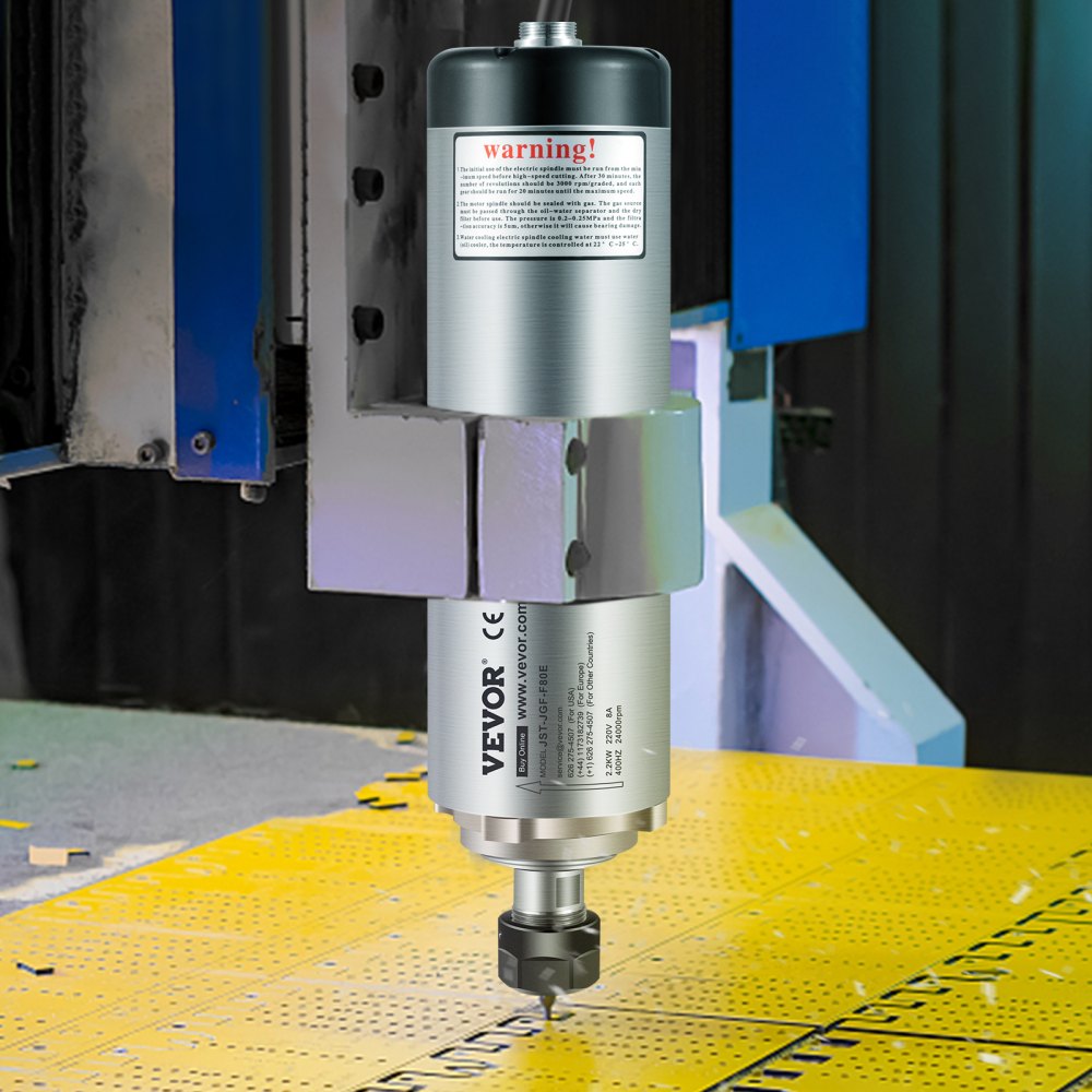 Motor de husillo CNC VEVOR montado en una máquina con una superficie de trabajo perforada amarilla.