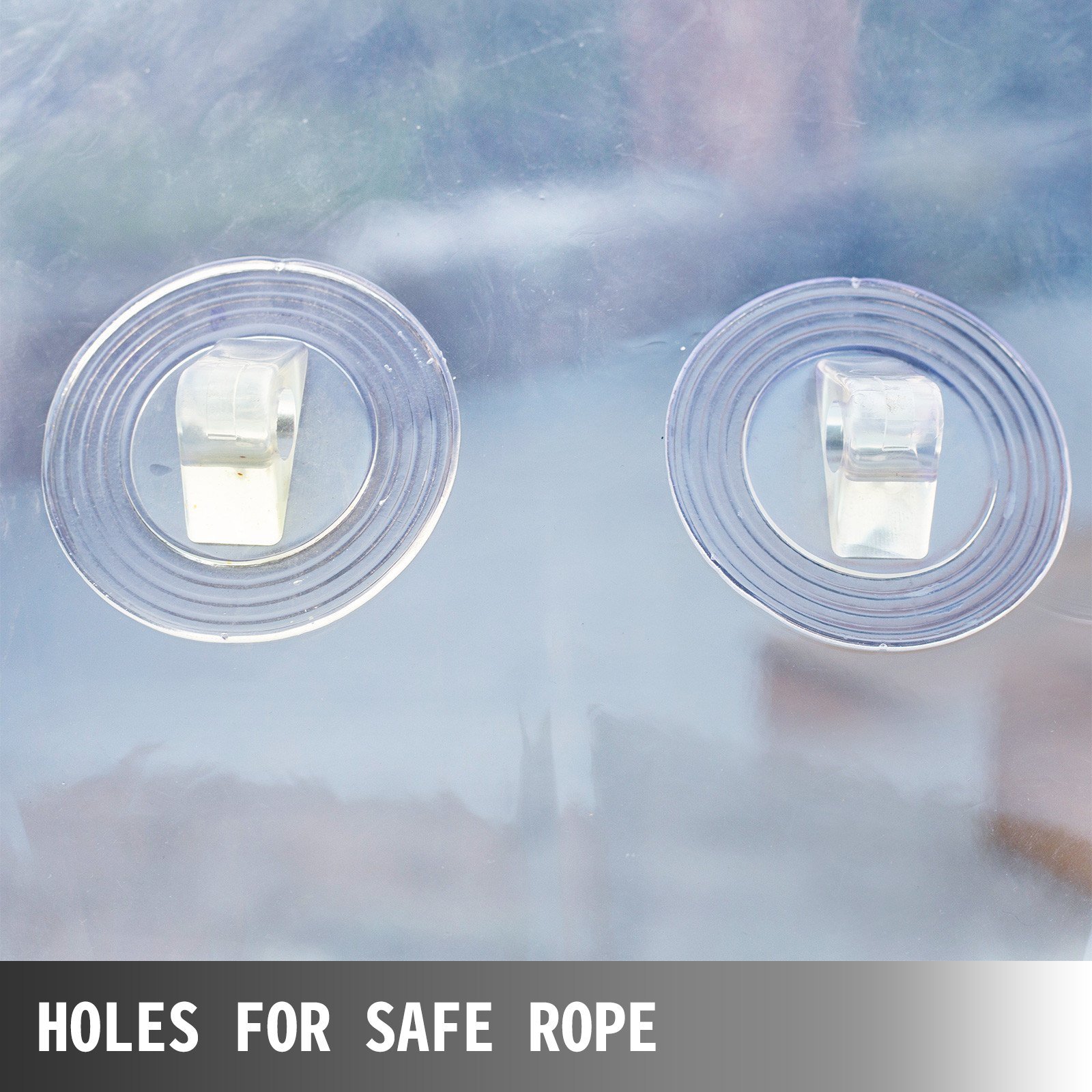 Superficie de plástico transparente con dos clips circulares etiquetados como &quot;agujeros para cuerda segura&quot; en la bola zorb VEVOR.