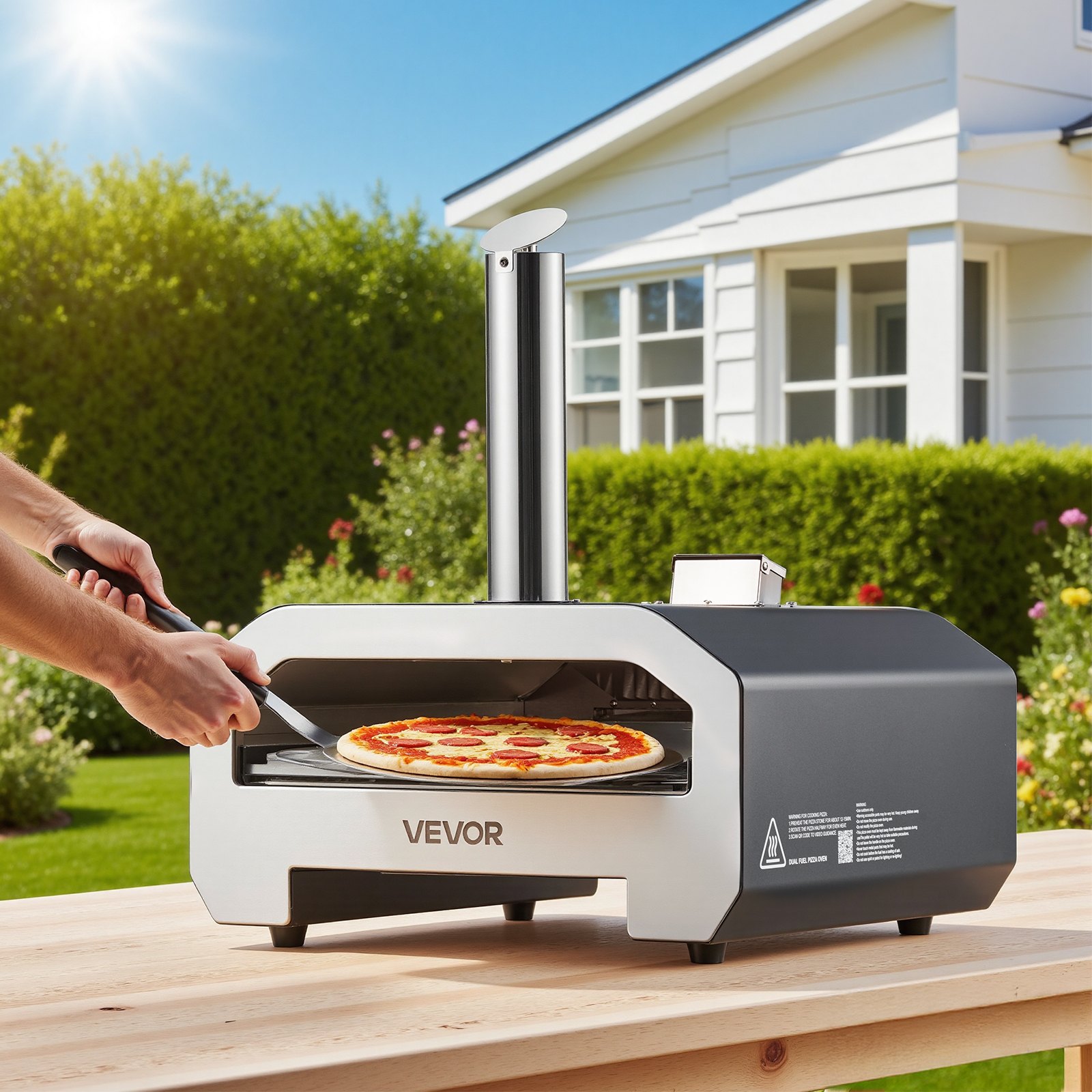 Horno de pizza VEVOR de doble combustible para exteriores, 40 cm (16 pulgadas), funciona con leña y gas propano. Horno portátil para hacer pizzas con pellets y propano, con termómetro y carcasa negra con acabado en pintura metalizada. Ideal para acampar y cocinar al aire libre.