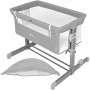 Cuna para bebé VEVOR en color gris con paneles laterales de malla y altura ajustable para un fácil acceso junto a la cama.