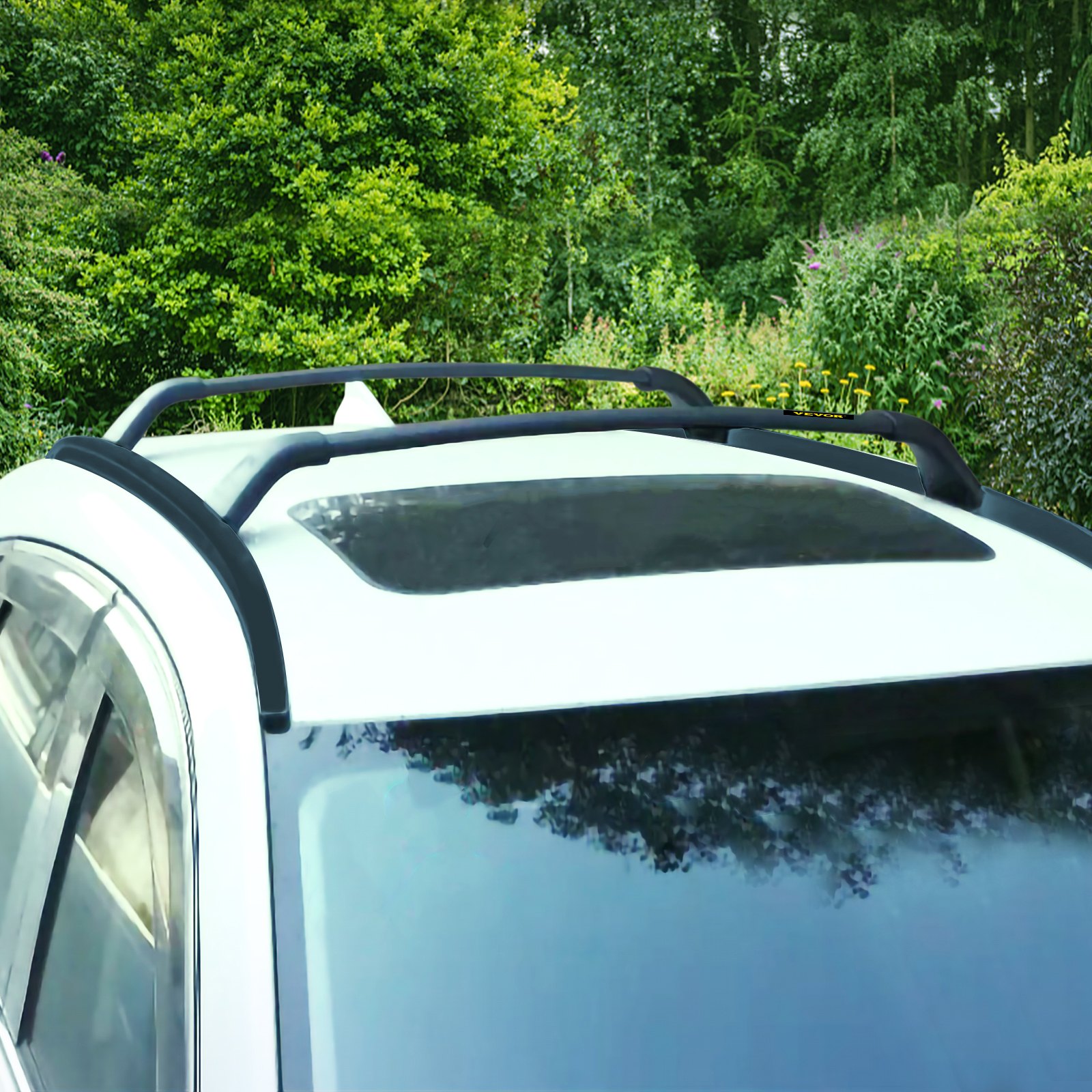 Portaequipajes VEVOR en un Mazda CX-5 blanco estacionado junto a frondosos árboles verdes.