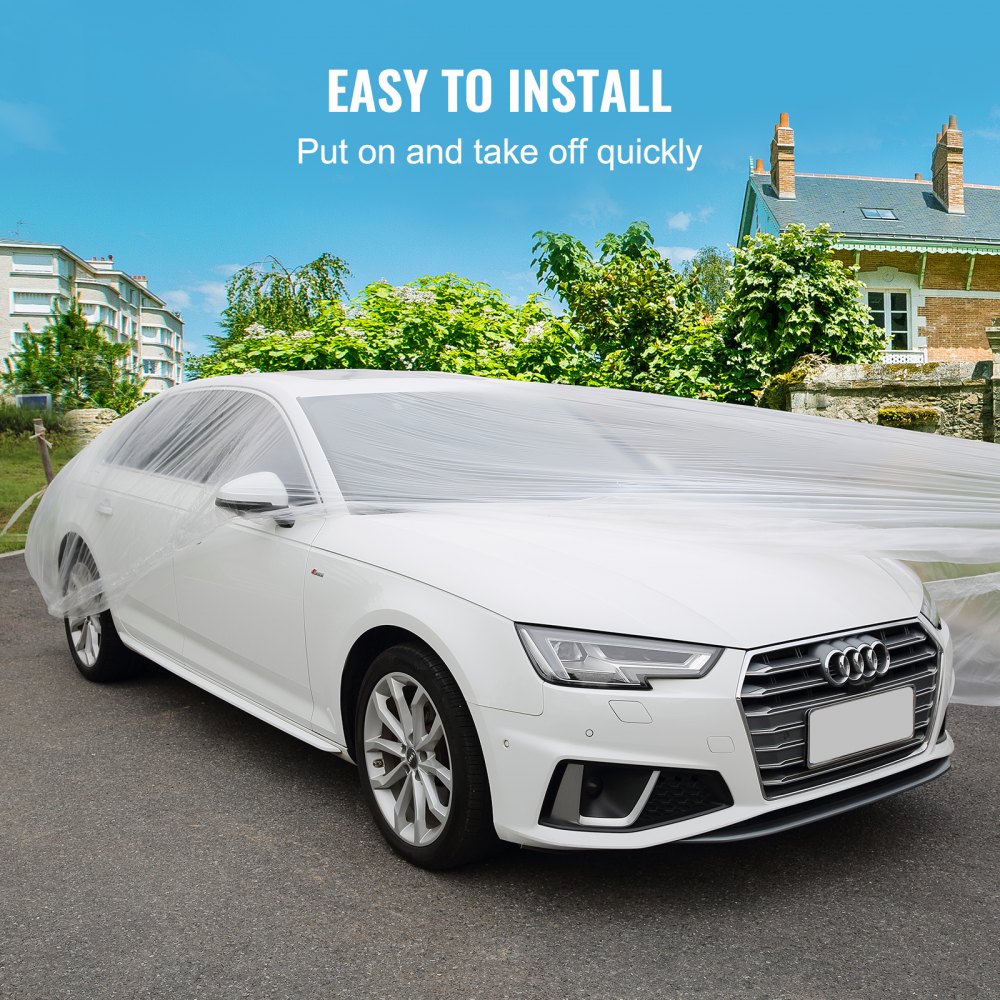 Funda de coche VEVOR en Audi blanco, rápida de instalar, con vegetación y edificios al fondo.