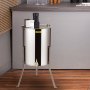 Extractor de miel eléctrico VEVOR de acero inoxidable en una cocina moderna con suelo y encimera de madera.