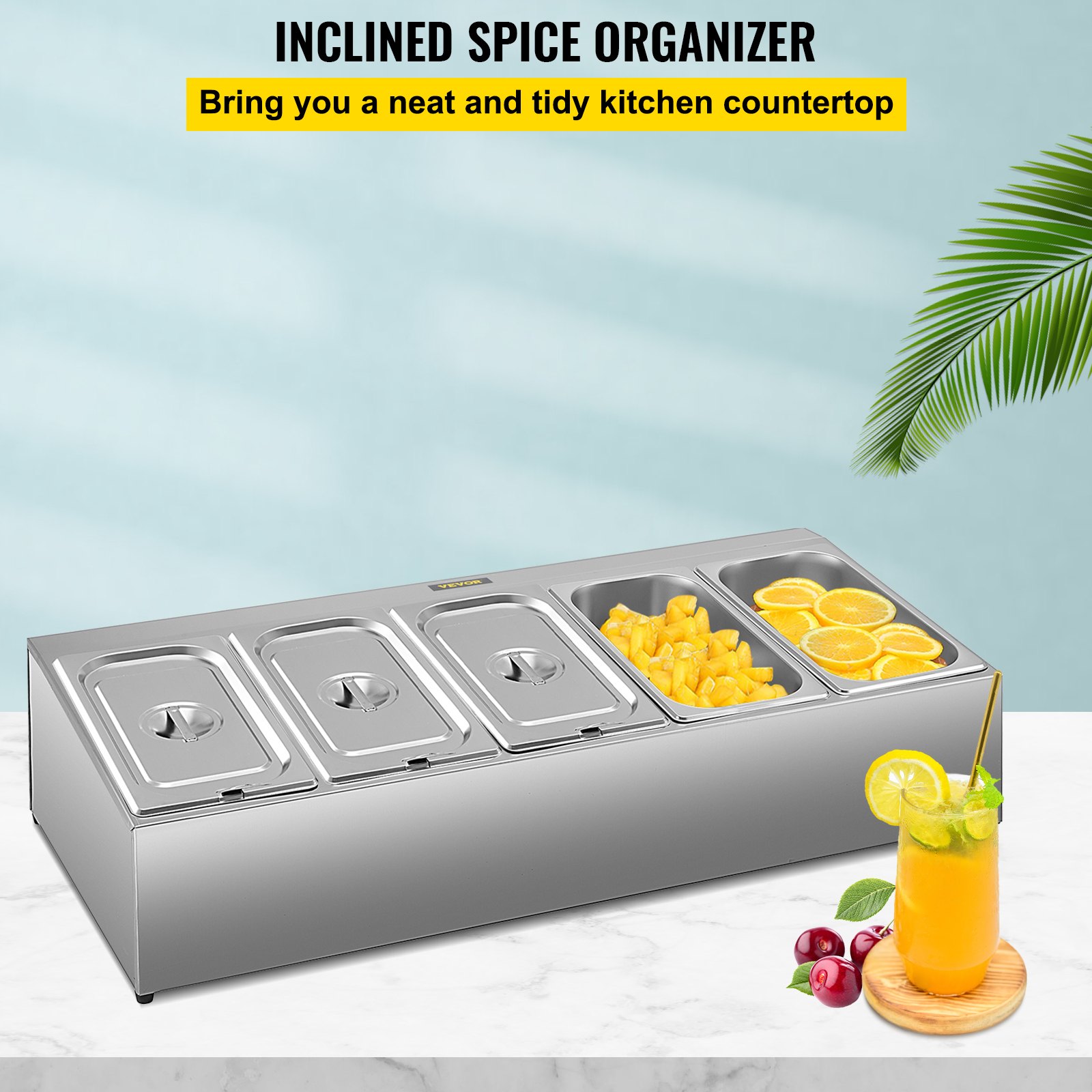 Estante de especias VEVOR que organiza ingredientes como piña, rodajas de naranja y cerezas en la encimera.