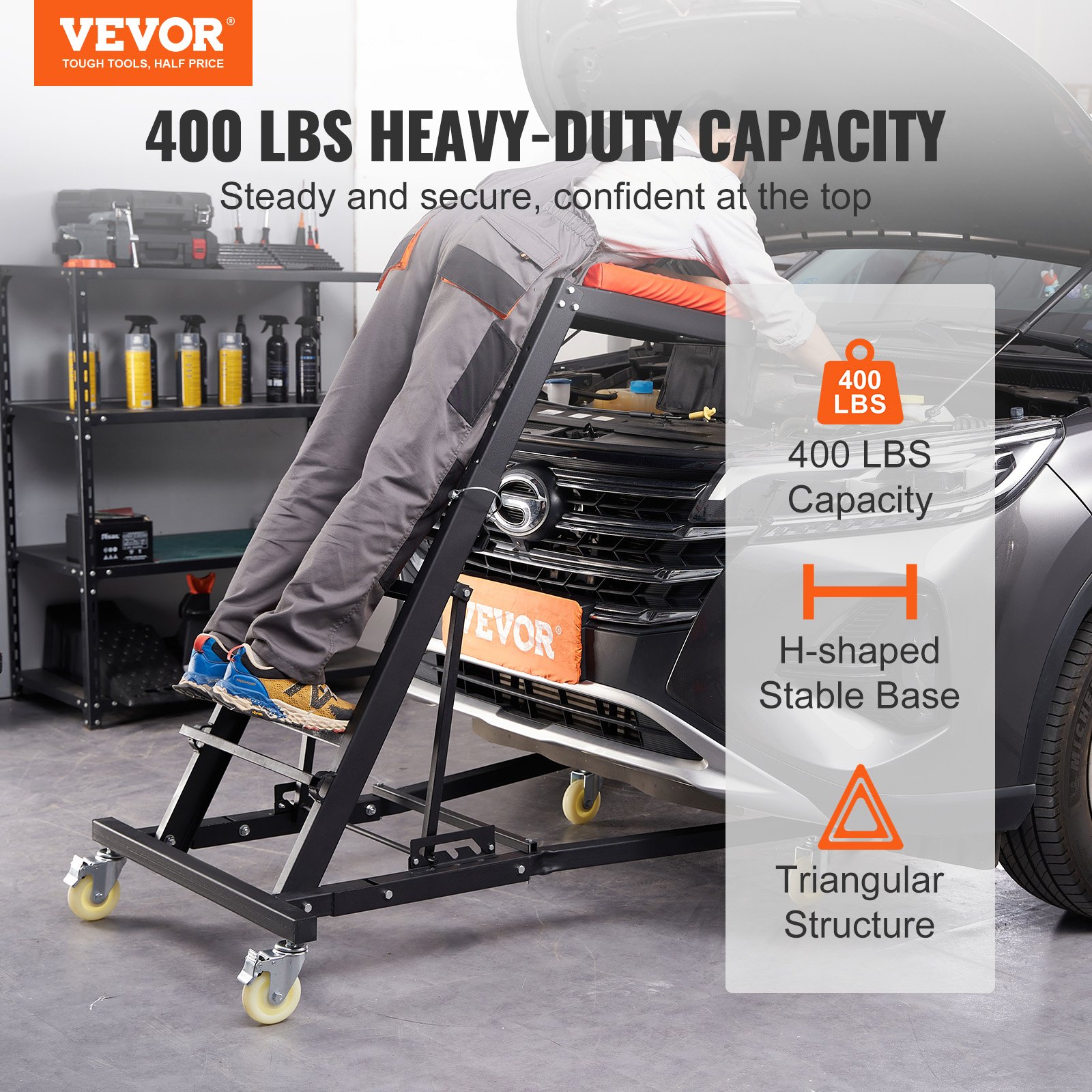 Camilla superior automotriz VEVOR en uso, con capacidad de 400 lb con base en forma de H y estructura triangular.