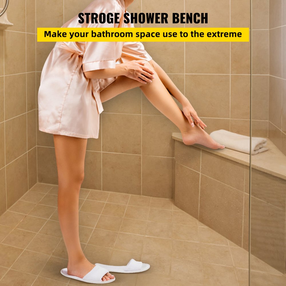 Mujer usando el asiento de ducha con azulejos VEVOR en un baño con azulejos beige con banco de ducha y toalla.