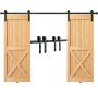 Puertas de madera con diseños en X sobre riel negro del kit de herrajes para puertas corredizas de granero VEVOR.