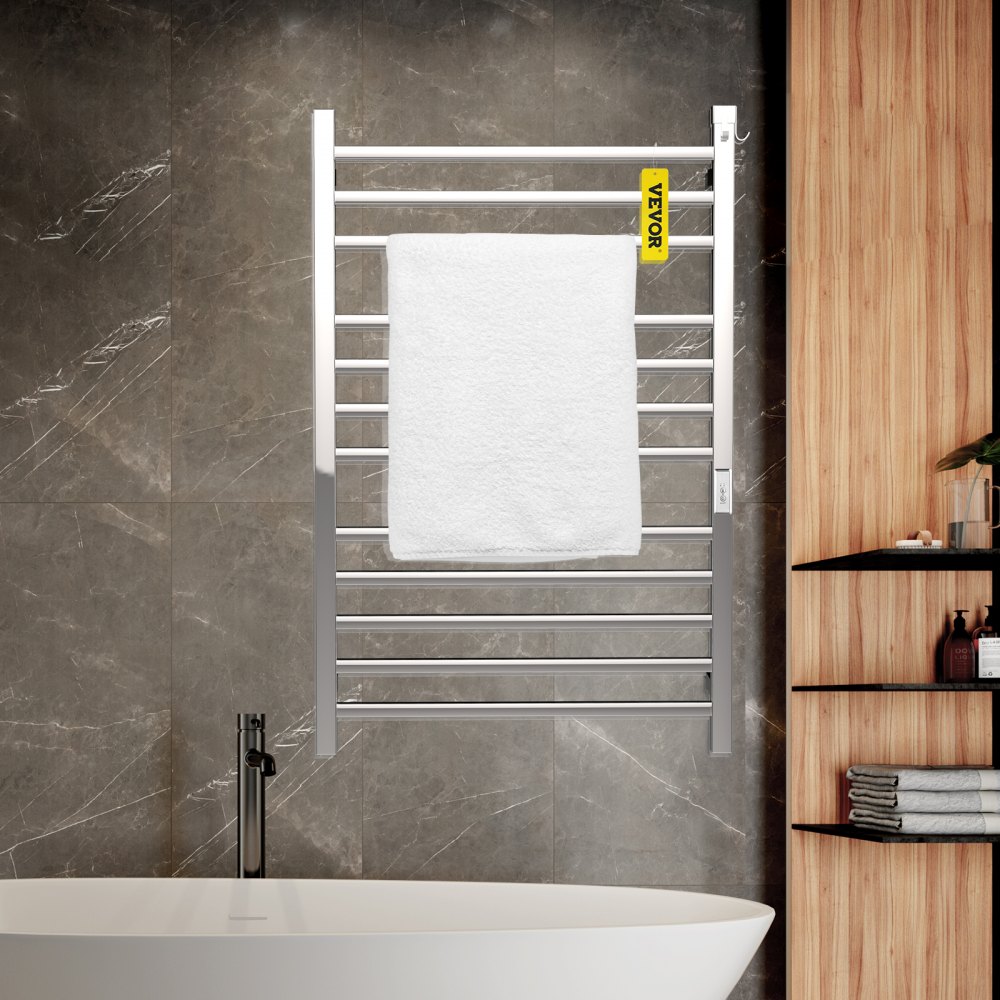 Toallero calefaccionado VEVOR con toalla blanca en baño moderno.