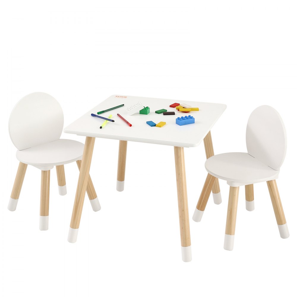 Juego de mesa para niños VEVOR con dos sillas blancas, lápices de colores y bloques de construcción sobre la mesa.