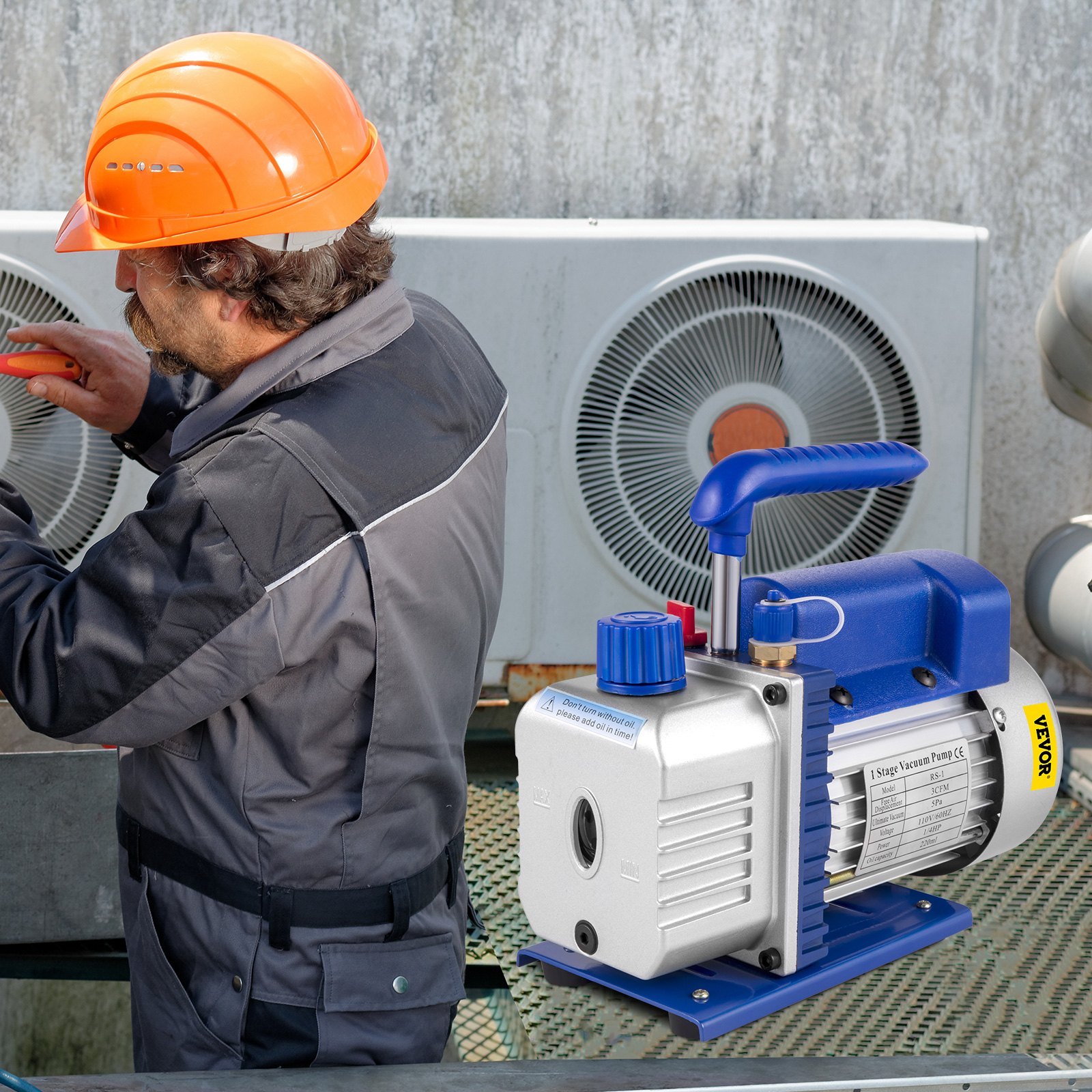 El técnico utiliza un kit de cámara de vacío VEVOR cerca de unidades de aire acondicionado.