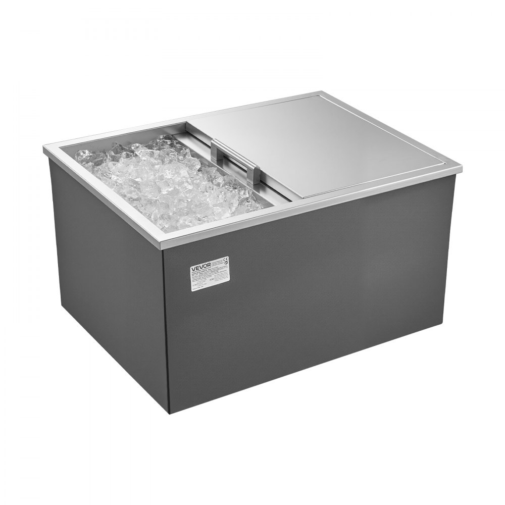 Hielera empotrable VEVOR, 61 cm de largo x 46 cm de ancho x 33 cm de alto, de acero inoxidable, con capacidad de 57.8 cuartos (54.5 litros) y tapa deslizante. Ideal para cocinas exteriores, patios y bares. Incluye juego de tubo de drenaje. Perfecta para enfriar vino y cerveza.