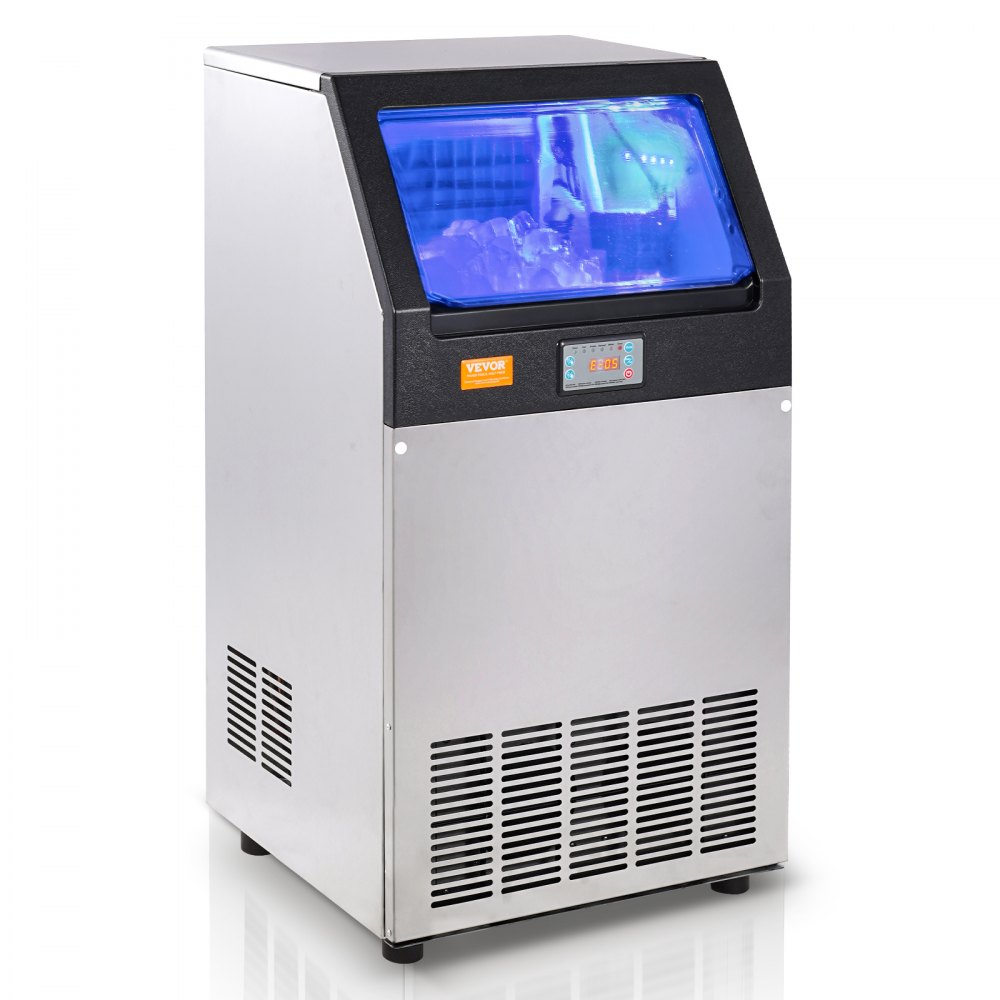 Máquina de hielo comercial VEVOR en acero inoxidable con luz interior azul y panel de control digital.