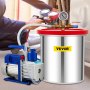Cámara de vacío VEVOR y bomba con manómetro, utilizadas en un taller para el mantenimiento del sistema HVAC.