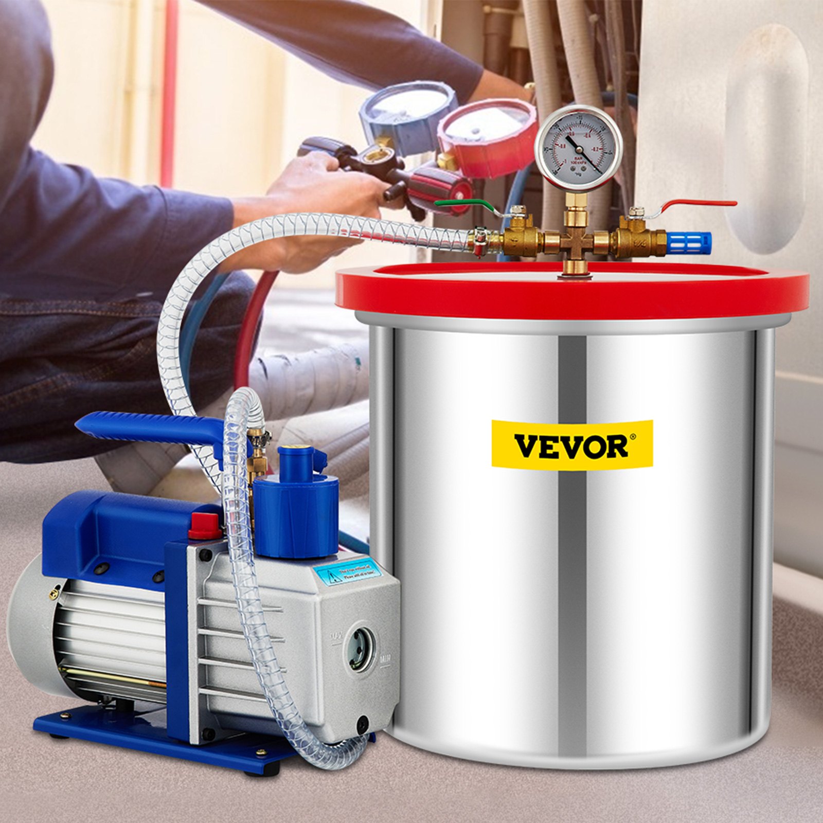 Cámara de vacío VEVOR y bomba con manómetro, utilizadas en un taller para el mantenimiento del sistema HVAC.
