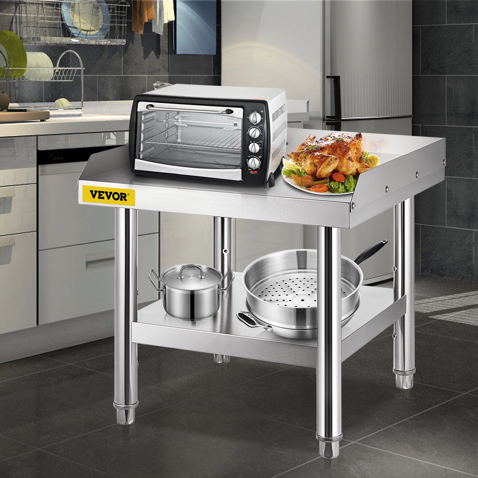 Parrilla de acero inoxidable VEVOR con horno, platos y utensilios de cocina en una cocina moderna.