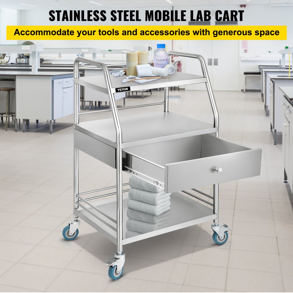 Carrito utilitario VEVOR en un entorno de laboratorio, con estantes, cajón y toallas en el estante inferior.