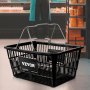 Cesta de la compra VEVOR negra con asas en el pasillo de un supermercado, con estantes con comestibles al fondo.