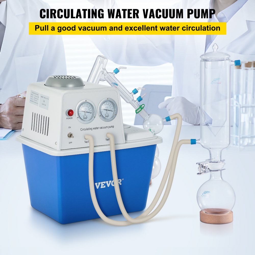Bomba de vacío VEVOR con manómetros y conjunto de tubos sobre mesa de laboratorio.