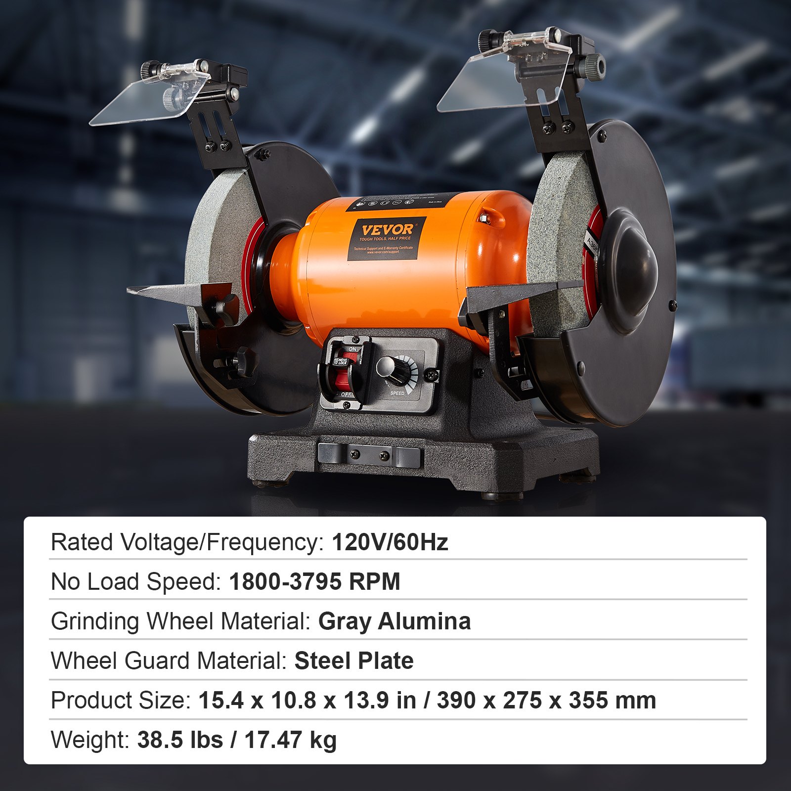 Amoladora de banco VEVOR con protectores de acero, muelas de alúmina gris y un motor naranja en un taller.