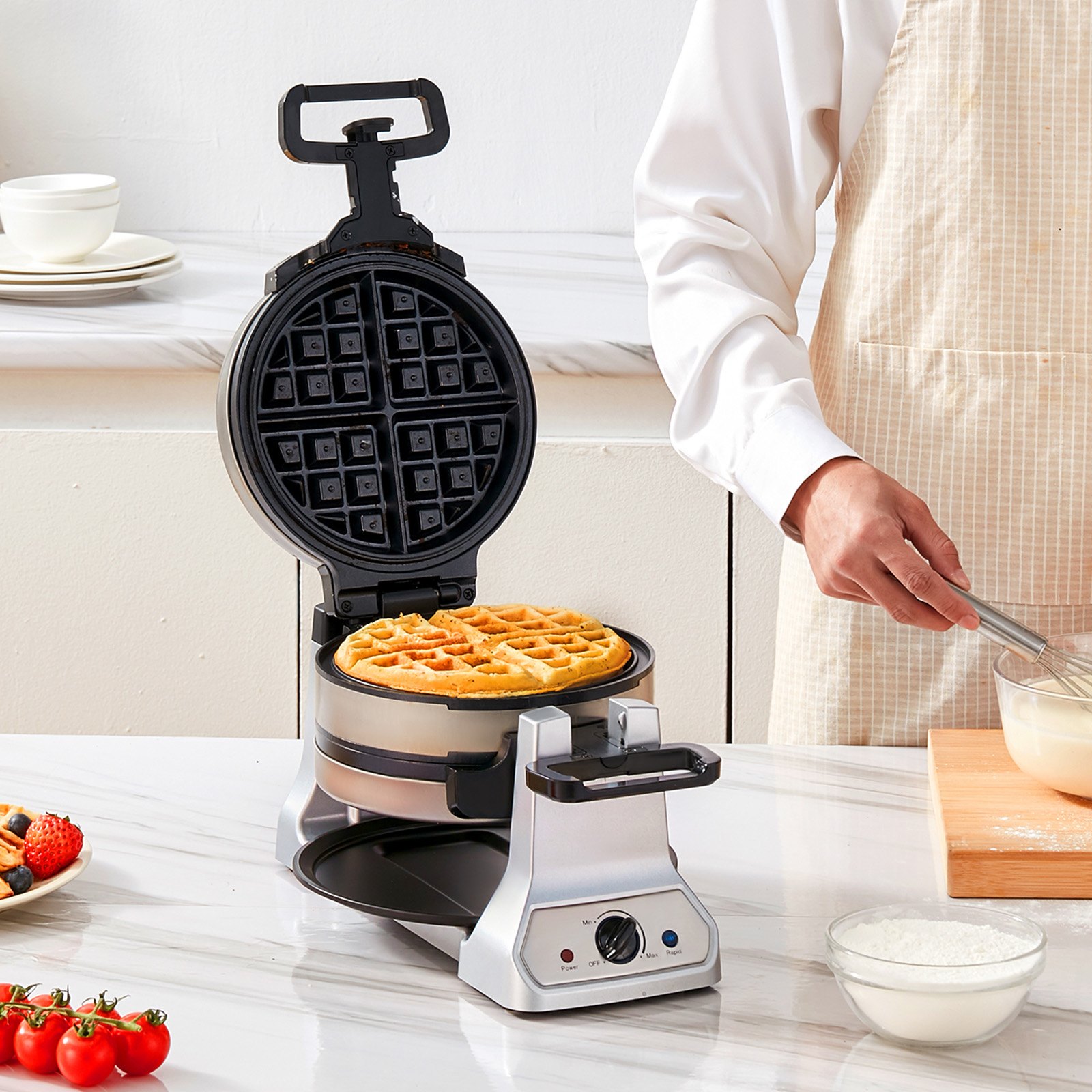 Preparando gofres frescos con una máquina para gofres VEVOR en un entorno de cocina moderno.