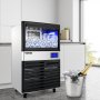 Máquina para fabricar hielo VEVOR en una cocina moderna con cubo lleno de hielo y champán.