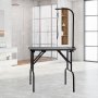 Mesa de aseo para mascotas VEVOR en una habitación moderna y luminosa con grandes ventanales y una decoración elegante.