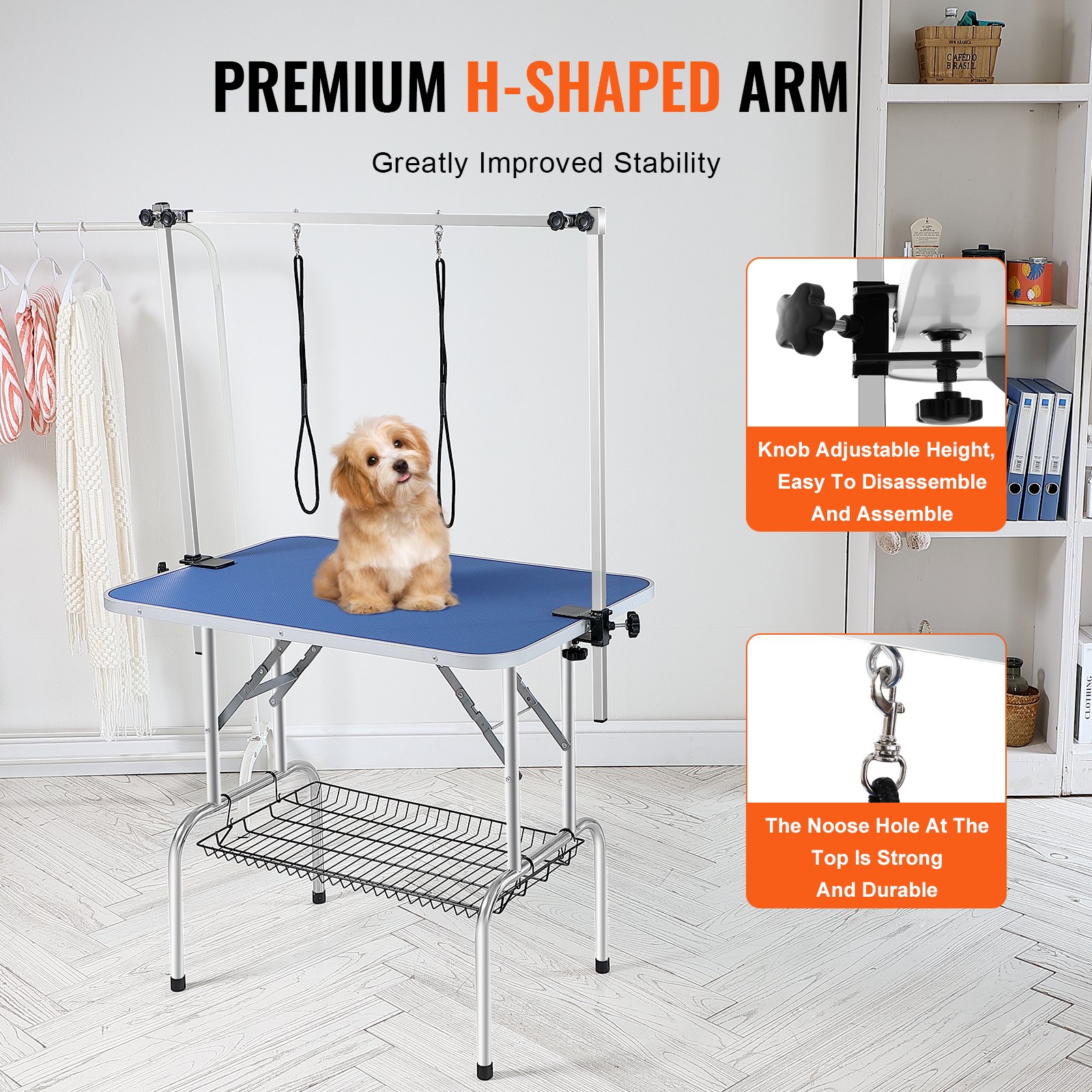 Mesa de aseo para mascotas VEVOR con brazo ajustable en forma de H y un perro pequeño sentado en la superficie azul.