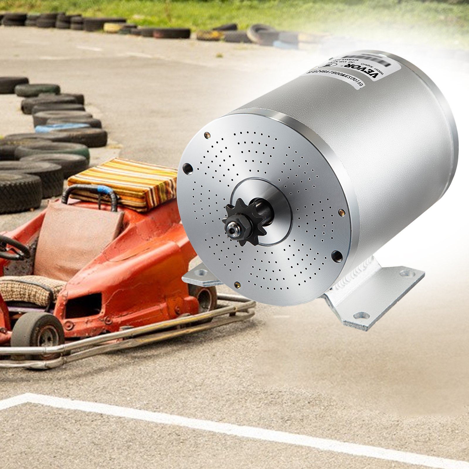 Motor sin escobillas VEVOR 2000w mostrado por un kart rojo cerca de una pista con neumáticos.