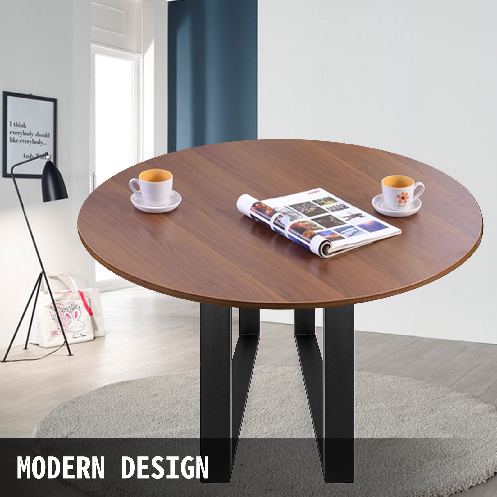 Mesa redonda de madera con patas de acero VEVOR, dos tazas y una revista.