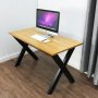 Patas de mesa de acero VEVOR que sostienen un escritorio de madera con una computadora, un teclado y un mouse.
