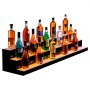 Exhibidor de botellas de licor con LED VEVOR que muestra varias botellas de licor en un estante iluminado de tres niveles.