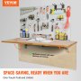 VEVOR wall mounted folding table with tools on a pegboard, featuring hydraulic bracket for easy fold.