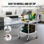 easily installable VEVOR stainless steel work table with accessories and tools in a well-organized garage.