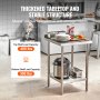 VEVOR stainless steel work table in kitchen; top shelf holds 400 lbs, bottom shelf holds 300 lbs.