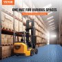 forklift in a warehouse with VEVOR garage tiles providing multi-purpose protection.