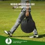 person carrying VEVOR golf chipping net in a round black bag, walking on a grassy field.