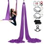 woman performing aerial yoga on a purple VEVOR aerial yoga hammock with included accessories.