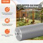 VEVOR hardware cloth roll in front of a wooden chicken coop, highlighting its durability and rust resistance.