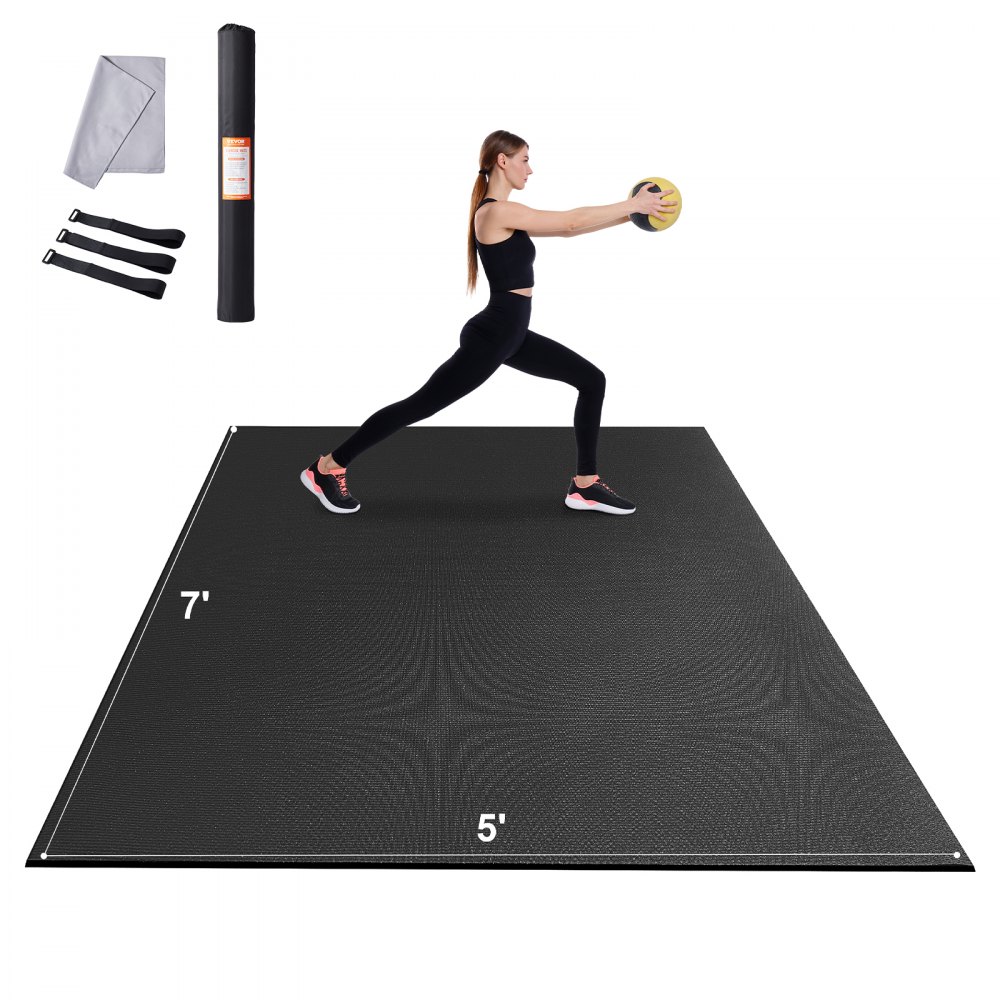 woman exercising on a black VEVOR exercise mat with accessories, performing a lunge while holding a medicine ball.