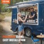 woman buying ice cream from a blue food truck featuring a VEVOR concession window in a scenic outdoor setting.