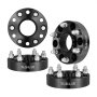 three black VEVOR wheel spacers with six bolt holes and silver studs arranged in different angles.